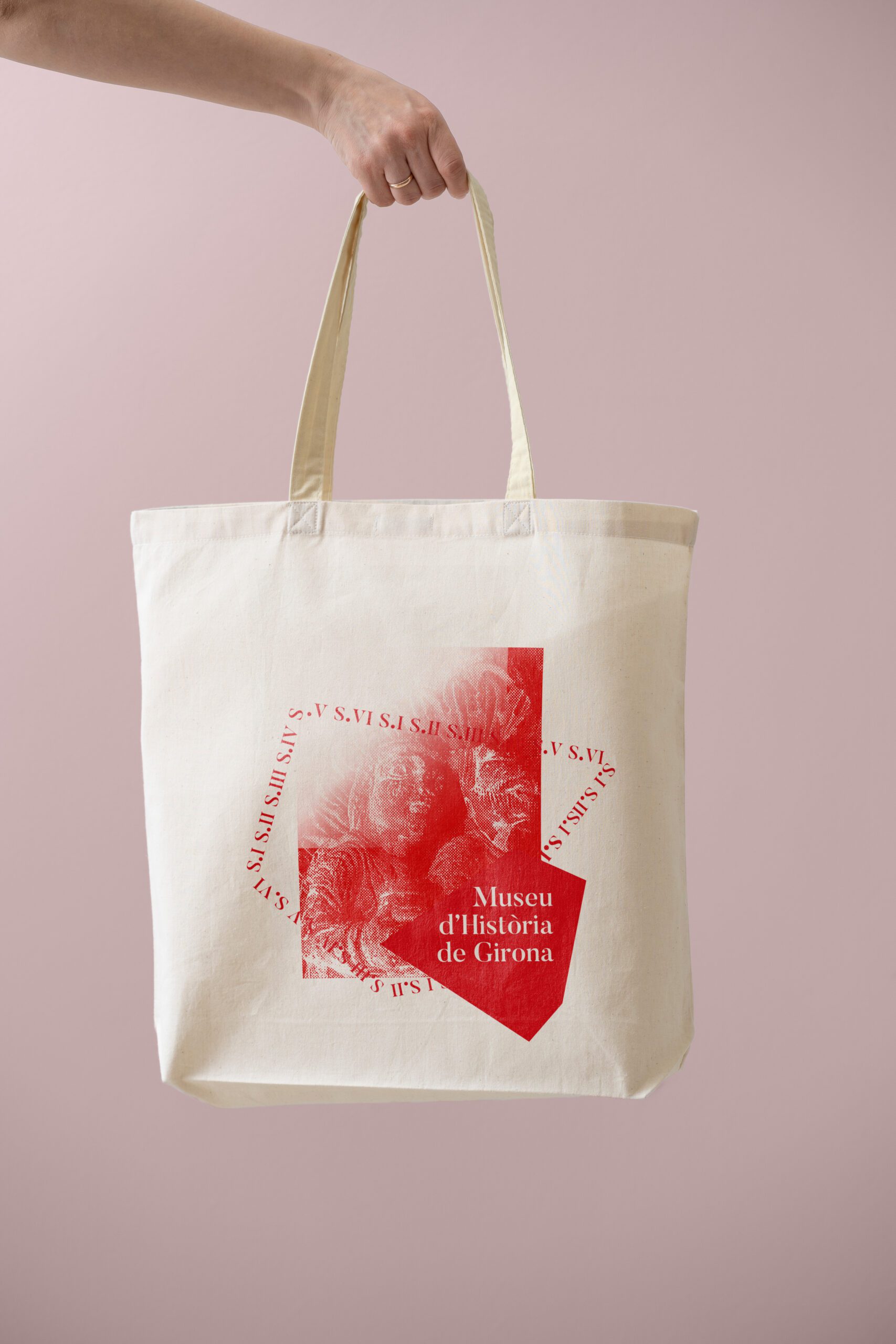 disseny publicitari, en bossa de ma o tote bag amb logo i imatge coorporativa